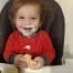 Happy Baby with Fluff on its face